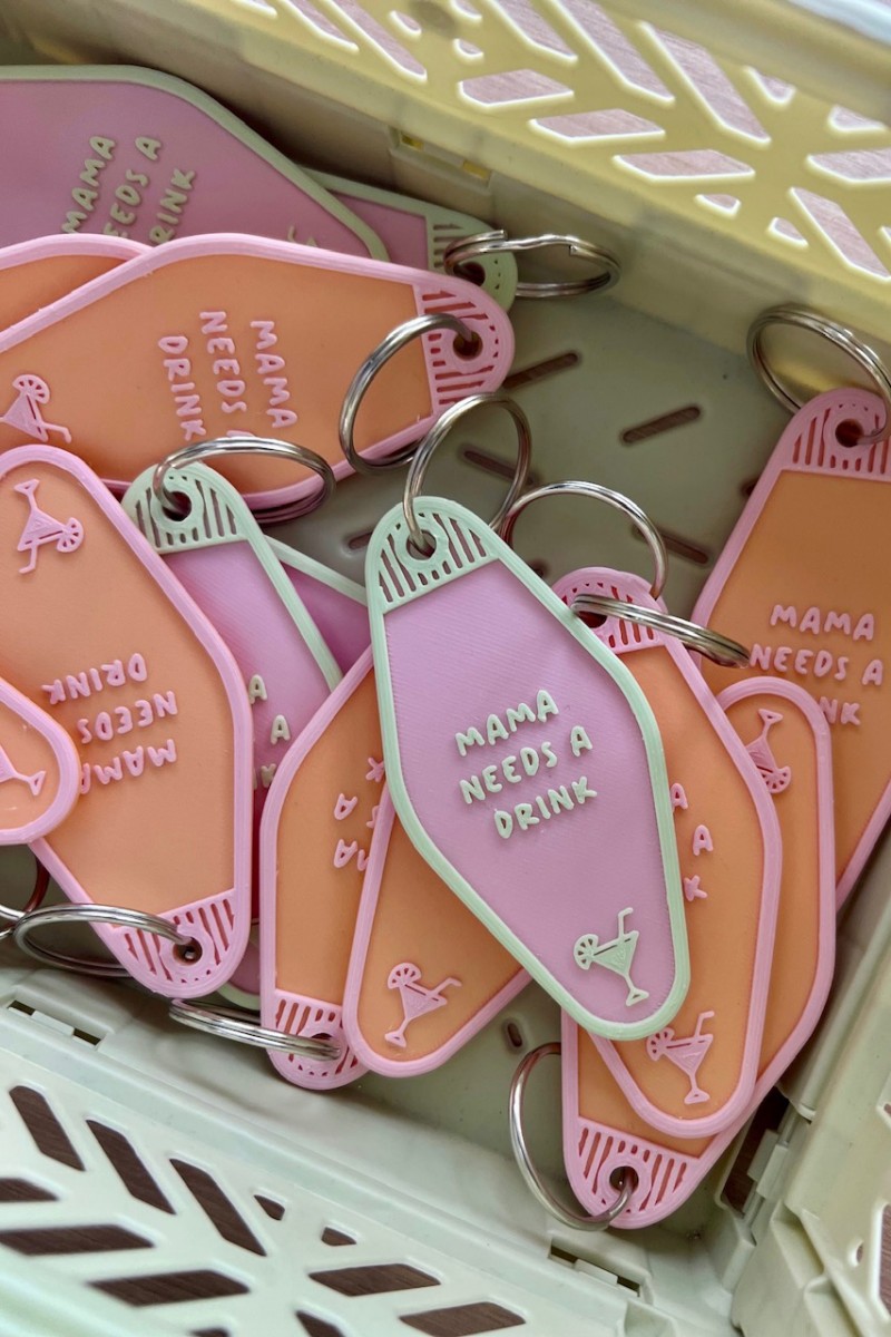 "mama needs a drink" key chain